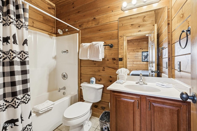 full bathroom featuring toilet, vanity, tile patterned flooring, wood walls, and shower / tub combo