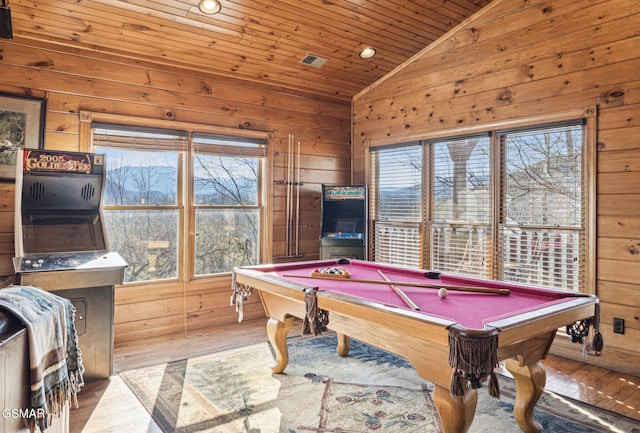 recreation room featuring lofted ceiling, wood ceiling, wood-type flooring, billiards, and wood walls