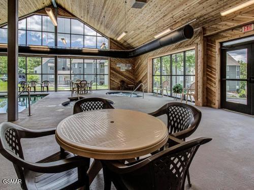 interior space featuring lofted ceiling and wood ceiling