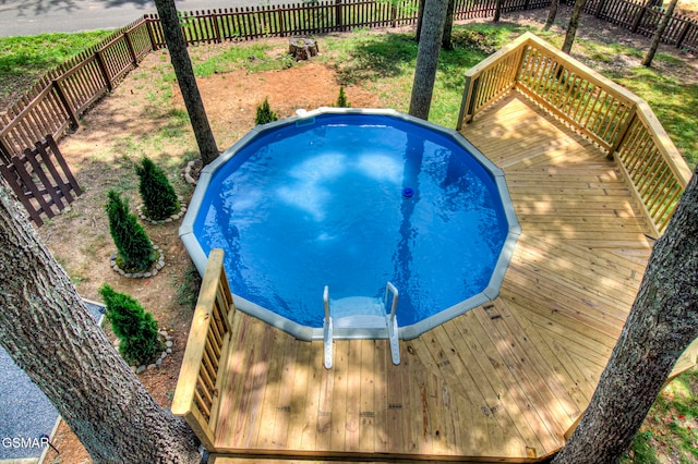 1125 Tanrac Trl, Gatlinburg, TN 37738 - view of swimming pool featuring a wooden deck and a fenced backyard