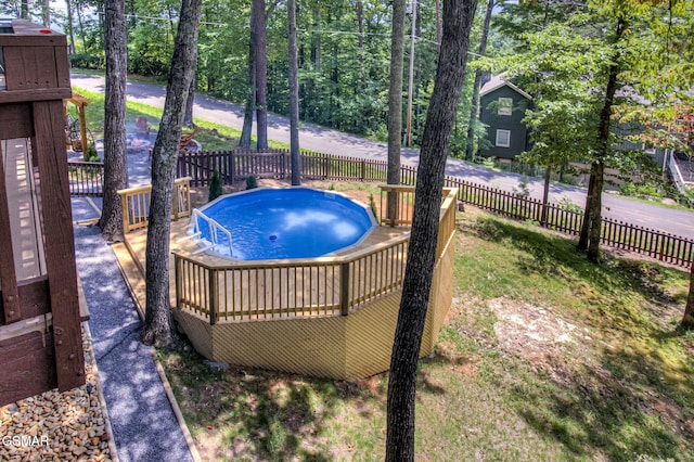 1125 Tanrac Trl, Gatlinburg, TN 37738 - view of swimming pool featuring fence and a jacuzzi