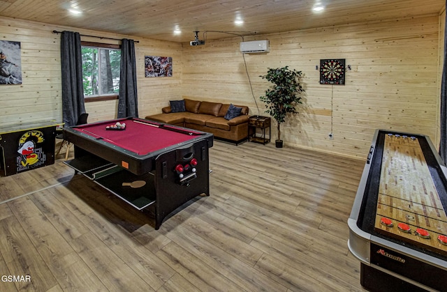 1125 Tanrac Trl, Gatlinburg, TN 37738 - playroom featuring wood finished floors, wood walls, billiards, wooden ceiling, and a wall mounted AC