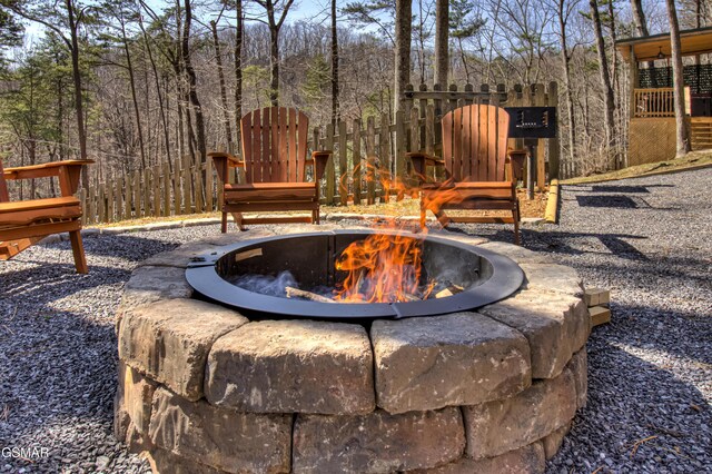 1125 Tanrac Trl, Gatlinburg, TN 37738 - view of yard featuring fence and an outdoor fire pit