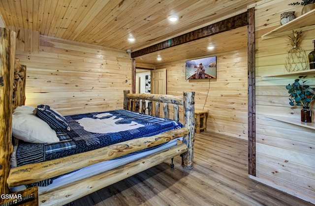 1125 Tanrac Trl, Gatlinburg, TN 37738 - bedroom featuring wood ceiling, wood finished floors, wood walls, and recessed lighting