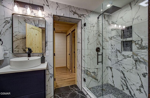 1125 Tanrac Trl, Gatlinburg, TN 37738 - full bath with tile walls, marble finish floor, vanity, and a marble finish shower