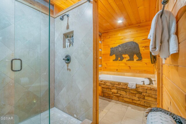 1918 Charles Lewis Way, Sevierville, TN 37876 - full bathroom with a shower stall, a bath, tile patterned floors, wooden ceiling, and wooden walls