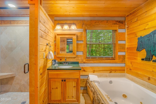 1918 Charles Lewis Way, Sevierville, TN 37876 - bathroom with wood ceiling, a tub with jets, wooden walls, vanity, and a stall shower