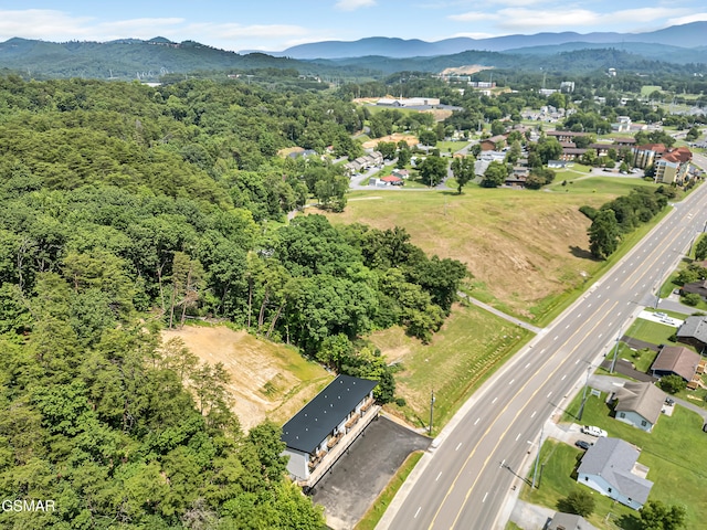3141 Teaster Ln Unit 1, Pigeon Forge, TN 37863 - aerial view of residential area with a mountain backdrop and a major roadway