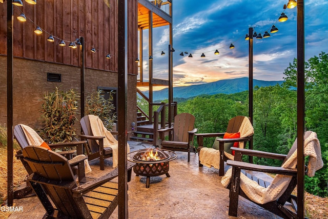 4408 Stackstone Rd, Sevierville, TN 37862 - view of patio / terrace featuring a fire pit, a mountain view, and stairway