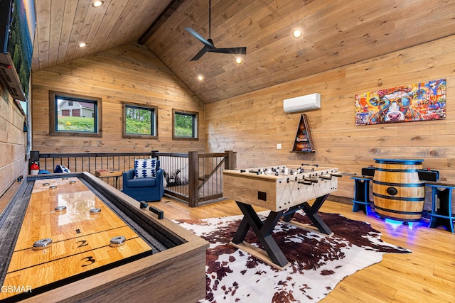 4408 Stackstone Rd, Sevierville, TN 37862 - playroom with a wall mounted air conditioner, wooden walls, recessed lighting, wooden ceiling, and wood finished floors