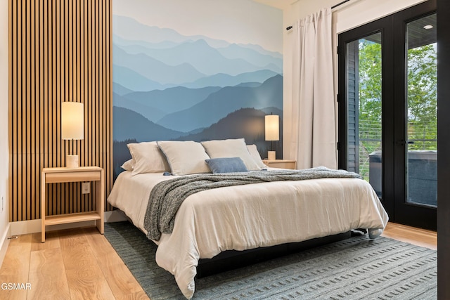 1163 Reedmont Way, Sevierville, TN 37876 - bedroom featuring a mountain view, french doors, wood finished floors, and access to outside