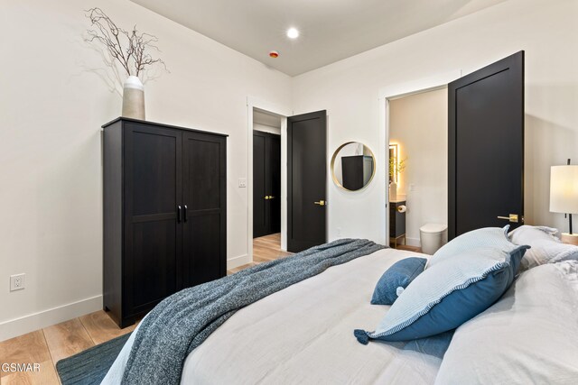 1163 Reedmont Way, Sevierville, TN 37876 - bedroom featuring light wood-style floors and ensuite bathroom