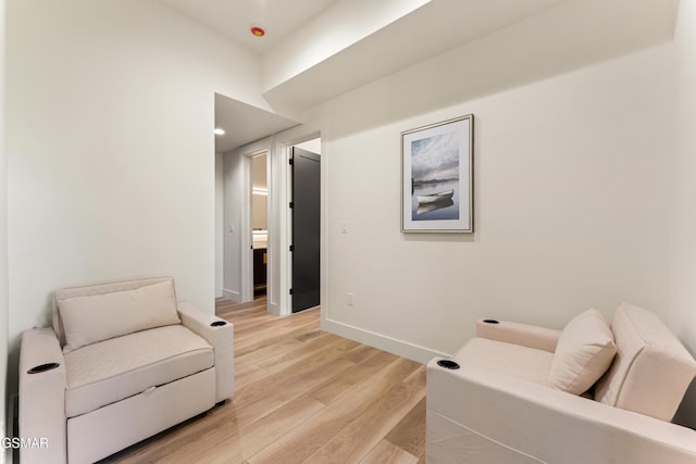 1163 Reedmont Way, Sevierville, TN 37876 - sitting room featuring baseboards and light wood-style flooring