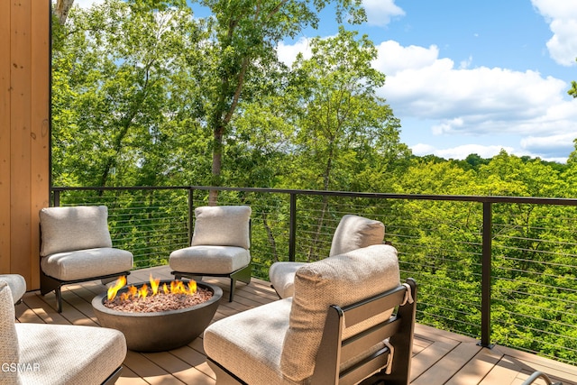 1163 Reedmont Way, Sevierville, TN 37876 - wooden terrace featuring an outdoor fire pit