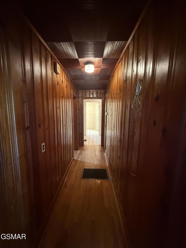 3380 Grassy Fork Rd, Hartford, TN 37753 - corridor with light wood finished floors and wooden walls