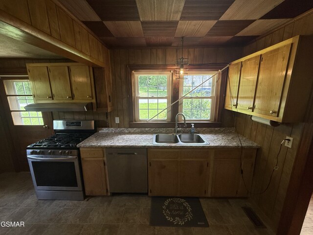 3380 Grassy Fork Rd, Hartford, TN 37753 - kitchen featuring appliances with stainless steel finishes, wooden walls, a sink, under cabinet range hood, and wood ceiling