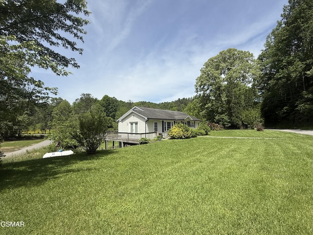 3380 Grassy Fork Rd, Hartford, TN 37753 - view of grassy yard with a deck