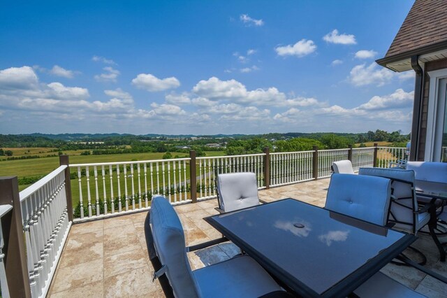 view of patio / terrace with a balcony