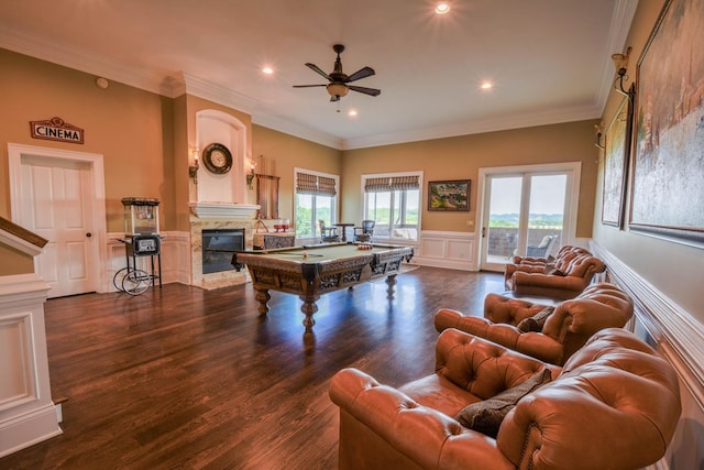 recreation room featuring ornamental molding, dark wood-type flooring, and pool table