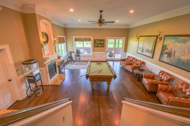 recreation room with dark hardwood / wood-style floors, ceiling fan, ornamental molding, and pool table