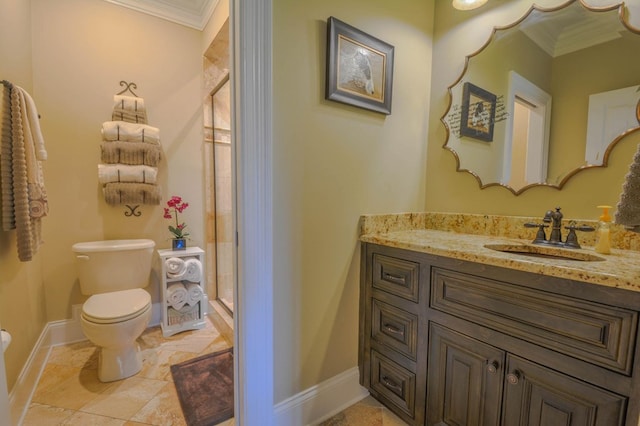 bathroom featuring toilet, vanity, a shower with shower door, and ornamental molding