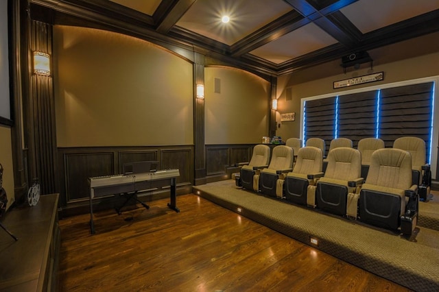 cinema featuring beam ceiling, crown molding, and coffered ceiling