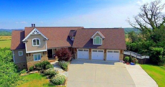 view of front facade featuring a garage and a front lawn