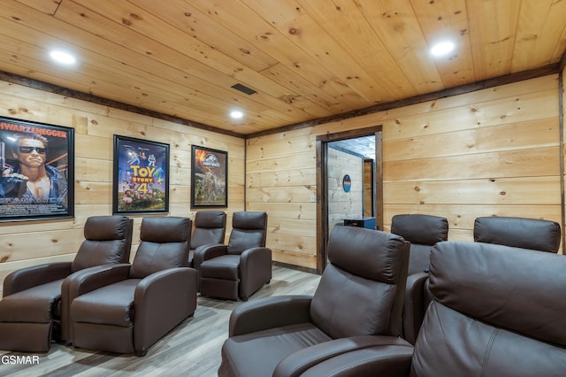 home theater with recessed lighting, wood ceiling, and wood finished floors