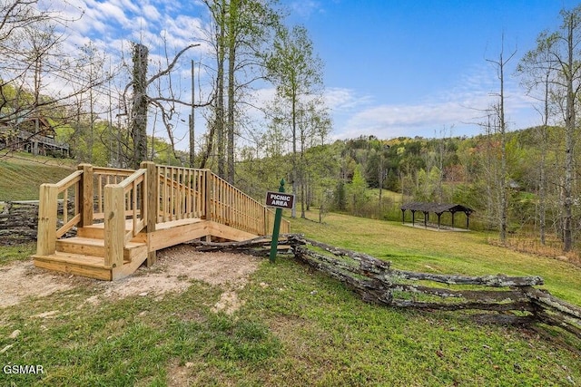 view of yard featuring a gazebo and a deck