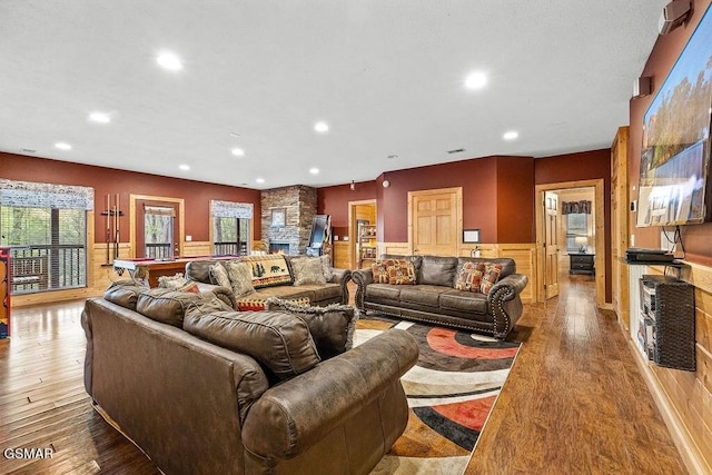 living room with light wood-type flooring and pool table