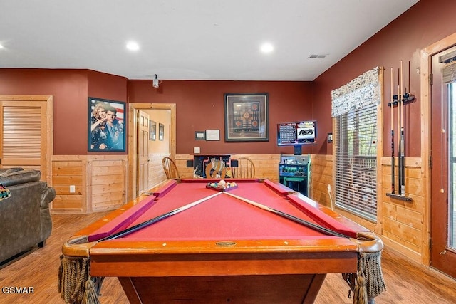 playroom featuring wooden walls, light hardwood / wood-style flooring, and pool table