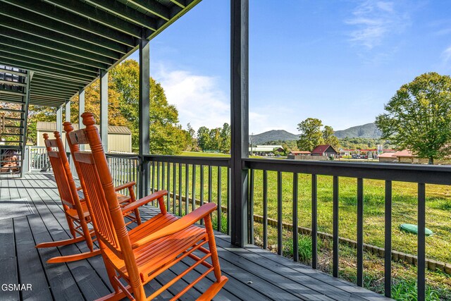 3225 Laurelwood Ave, Sevierville, TN 37862 - wooden deck featuring a yard and a mountain view