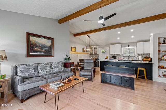 3225 Laurelwood Ave, Sevierville, TN 37862 - living area featuring lofted ceiling with beams, recessed lighting, light wood-style floors, and ceiling fan