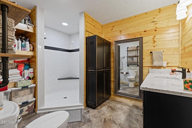 3225 Laurelwood Ave, Sevierville, TN 37862 - full bath with wooden walls, vanity, a shower stall, and toilet
