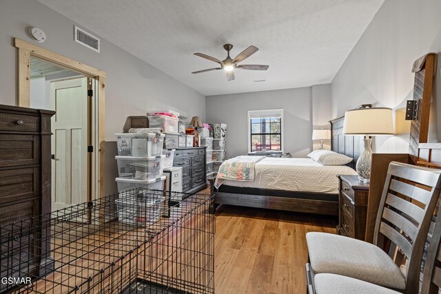 3225 Laurelwood Ave, Sevierville, TN 37862 - bedroom with wood finished floors, visible vents, a textured ceiling, and a ceiling fan