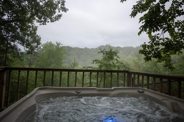 deck with a hot tub