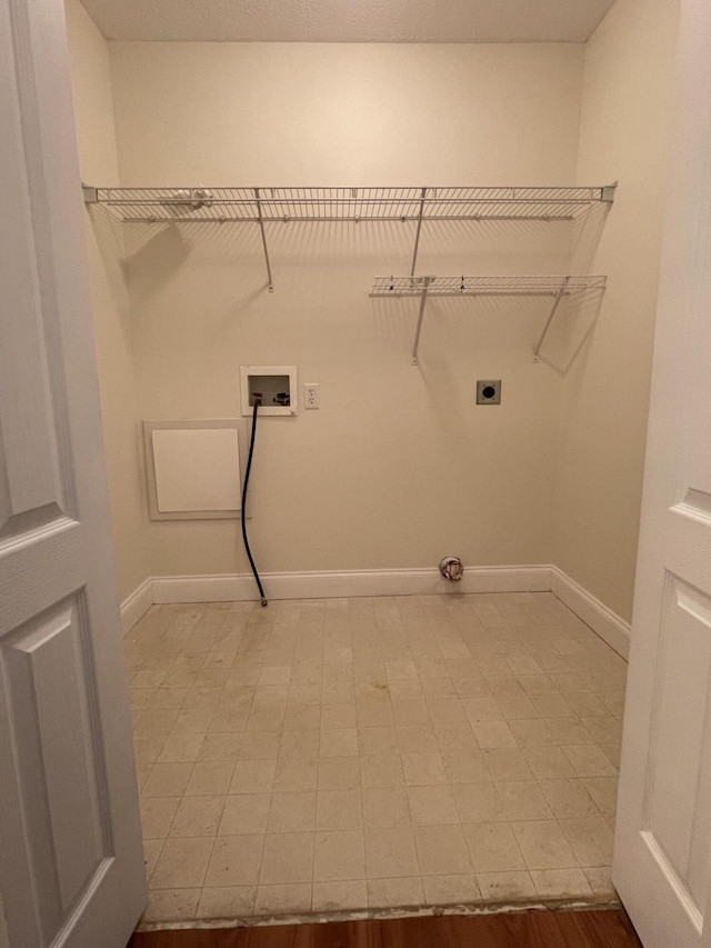 clothes washing area with electric dryer hookup and hookup for a washing machine