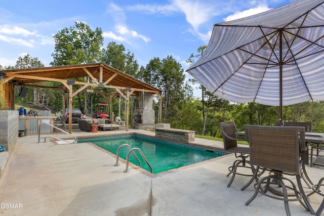 pool with a gazebo and a patio