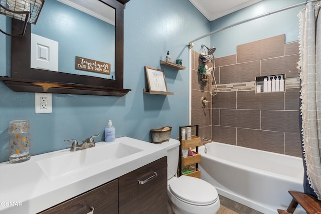 bathroom featuring ornamental molding, toilet, shower / tub combo with curtain, vanity, and wood finished floors