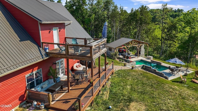 exterior space with an outdoor pool, french doors, a wooden deck, an outdoor hangout area, and a gazebo