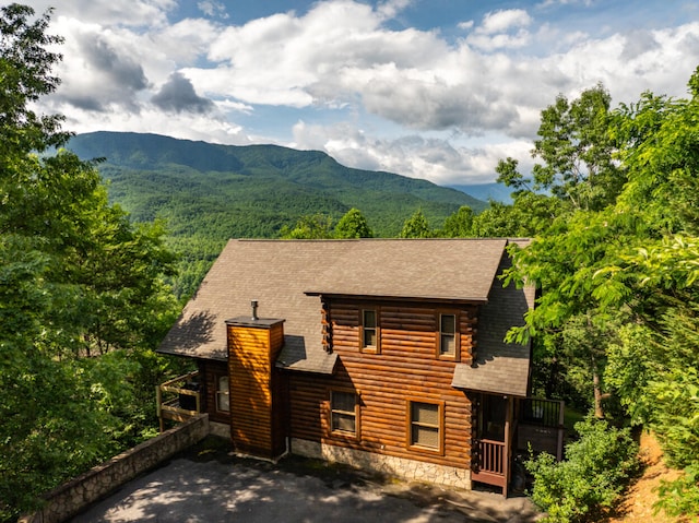 view of front of home with a mountain view