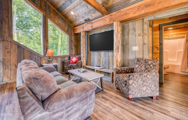 809 Pinecrest Way, Sevierville, TN 37862 - living room featuring wood ceiling with exposed beams, wood walls, and wood finished floors