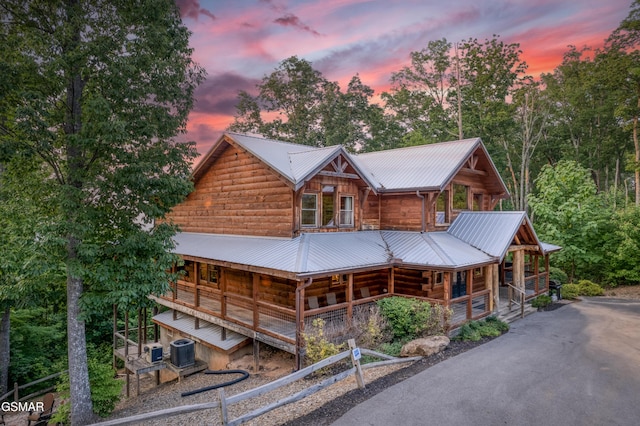 809 Pinecrest Way, Sevierville, TN 37862 - view of front of house with a porch, central AC, and metal roof