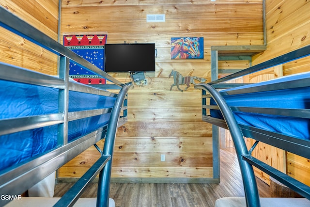 809 Pinecrest Way, Sevierville, TN 37862 - bedroom featuring wood walls and wood finished floors