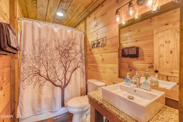 809 Pinecrest Way, Sevierville, TN 37862 - bathroom featuring wooden ceiling, wood walls, toilet, a shower with shower curtain, and vanity