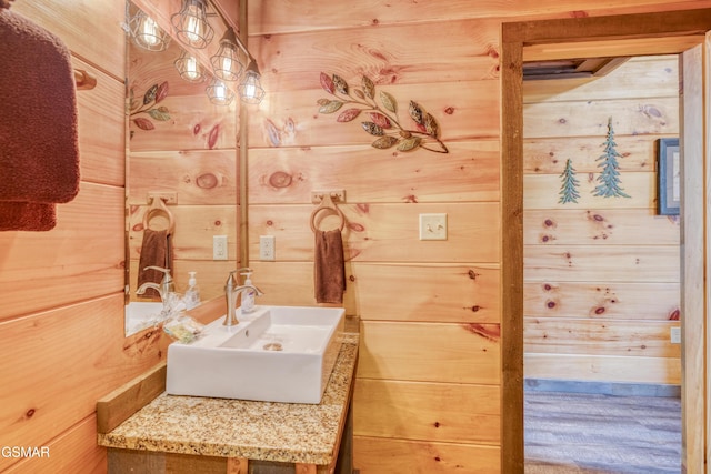 809 Pinecrest Way, Sevierville, TN 37862 - bathroom with a sink and wood walls
