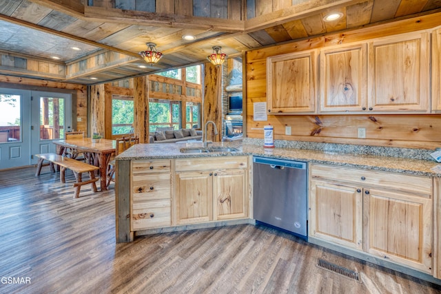 809 Pinecrest Way, Sevierville, TN 37862 - kitchen featuring dishwasher, light brown cabinetry, a sink, wood walls, and wood ceiling with exposed beams