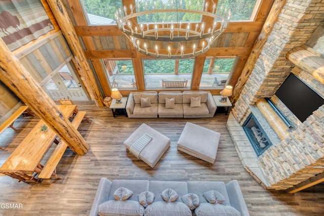809 Pinecrest Way, Sevierville, TN 37862 - living area featuring a chandelier, wood finished floors, and a towering ceiling