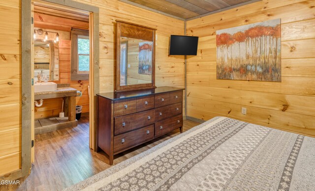 809 Pinecrest Way, Sevierville, TN 37862 - bedroom with wood walls, wood finished floors, and wood ceiling