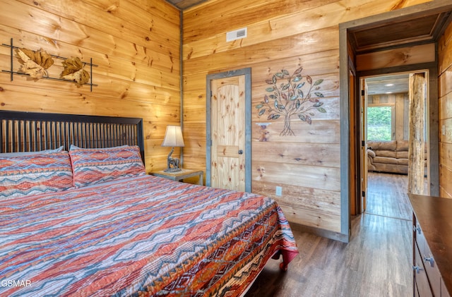 809 Pinecrest Way, Sevierville, TN 37862 - bedroom featuring wooden walls and wood finished floors